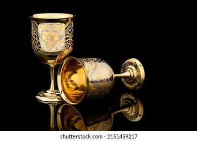 Couple Golden Antique Vintage Brass Shot Glass Gilded on black background. metal Wine Cup goblet with Carving Engraving pattern. - Shutterstock ID 2151459217