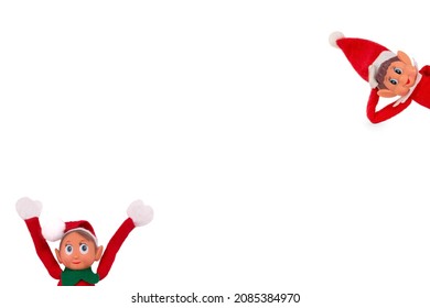 A Couple Of Goofy Isolated Christmas Elves  On A White Background With Copy Space