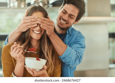 Couple, hands and eyes closed for surprise in home, woman and eating strawberries or man for romance gesture. Relationship, bonding and happy together for commitment, care and apartment with love - Powered by Shutterstock