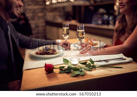Couple have romantic evening in restaurant 