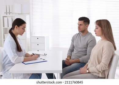 Couple Having Appointment With STD Specialist In Clinic