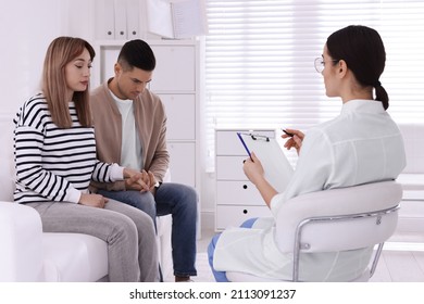 Couple Having Appointment With STD Specialist In Clinic