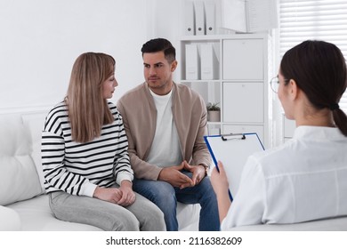 Couple Having Appointment With STD Specialist In Clinic