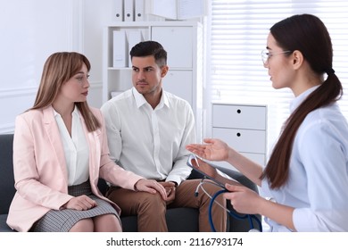 Couple Having Appointment With STD Specialist In Clinic