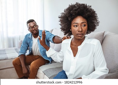 Couple Having Argument - Conflict, Bad Relationships. Unhappy Couple After an Argument in the Living Room at Home. Making Decision of Breaking Up Get Divorced