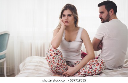 Couple Having Arguments And Sexual Problems In Bed