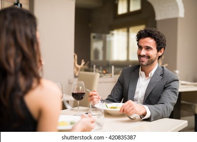 Couple Having Dinner In A Luxury Restaurant