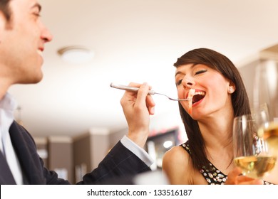 Couple having dinner in a restaurant - Powered by Shutterstock