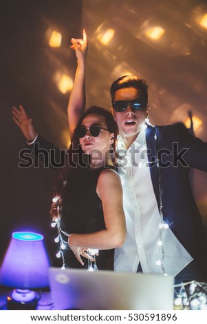 Couple having fun at the club. New year party