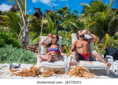 Couple Having Fun At A Local Beach Near Cancun. Mexico.