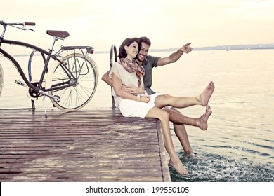 couple having fun on vacation at the lake - Powered by Shutterstock
