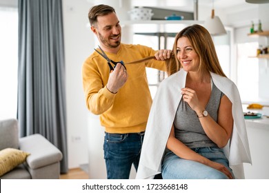 Couple Having Hair Cut At Home During Quarantine Coronavirus Pandemic, Online Hairdressing On Tablet