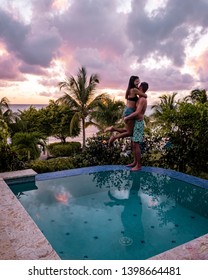 Couple Having Lunch By The Infinity Pool, Men And Woman Lunch In Swimming Pool St Lucia