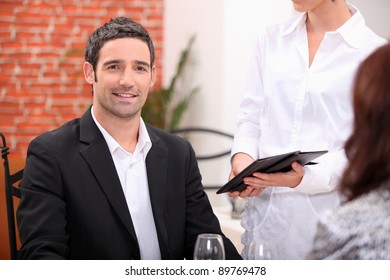 Couple Having A Meal In A Fancy Restaurant