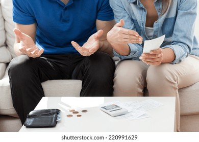 Couple Having Not Enough Money For Bills