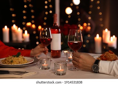 Couple Having Romantic Dinner In Restaurant, Closeup