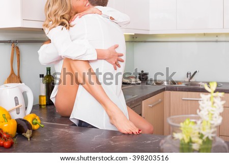 Couple Having Sex On Kitchen Counter Couple Having Sex On Kitchen Counter