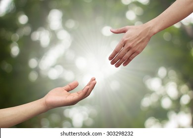 couple help hand blessing praying nature background for spiritual power of life concept.