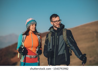 Couple Hikers On A Mountaintop