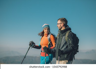 Couple Hikers On A Mountaintop