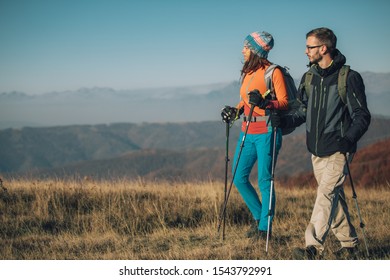 Couple Hikers On A Mountaintop