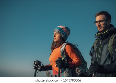 Couple Hikers On A Mountaintop