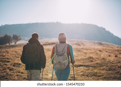 Couple Hikers On A Mountaintop