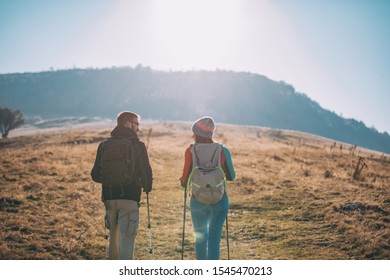 Couple Hikers On A Mountaintop