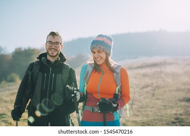 Couple Hikers On A Mountaintop