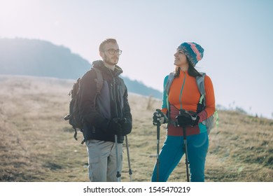 Couple Hikers On A Mountaintop