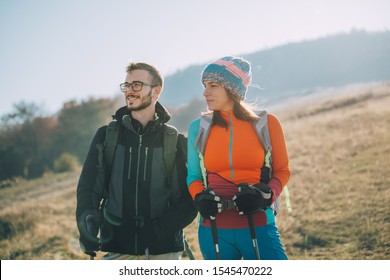 Couple Hikers On A Mountaintop