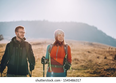 Couple Hikers On A Mountaintop