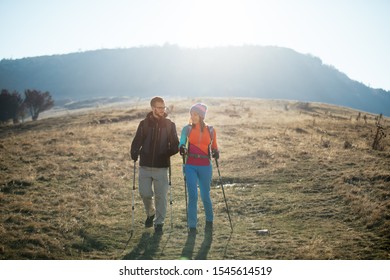 Couple Hikers On A Mountaintop