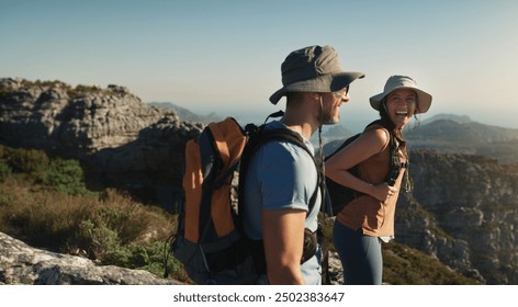 Couple, hiking and mountain on cliff outdoor for fitness travel, adventure view and backpack journey. People, backpacking and trekking together for cardio exercise, rock climbing and health in summer - Powered by Shutterstock