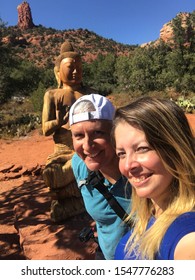 Couple Hiking In Sedona , Arizona