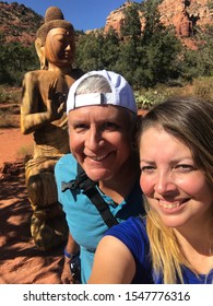 Couple Hiking In Sedona , Arizona