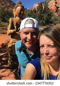 Couple Hiking In Sedona , Arizona