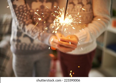 Couple Holding Bengal Light