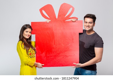 Couple Holding Big Gift Box Cut Out