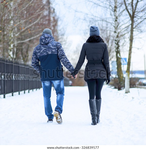 Couple Holding Each Others Hands Winter Stock Photo (Edit Now) 326839577