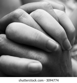 A Couple Holding Hands Close Up.