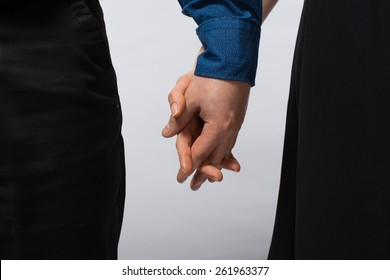 Couple holding hands. Man and woman holding hands,