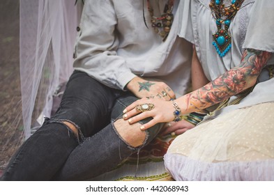 Couple Holding Hands With Tatoo. Boho Wedding. Tatoo