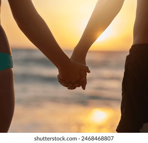 Couple, holding hands and together by ocean with love on tropical vacation, romantic getaway and journey for travel adventure. Man, woman and beach in Maldives for holiday, commitment and support. - Powered by Shutterstock