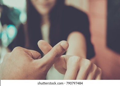 Couple holding hands together as forever love by promise hands sign . Vintage filter - Shutterstock ID 790797484