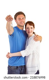 Couple Holding Keys To Home On White Background