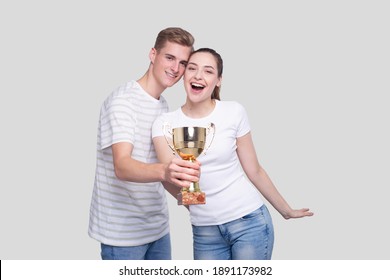 Couple Holding Trophy Happy Isolated. Couple Goals. Winners