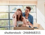 Couple, home and moving with propose surprise, man and hand for closed eyes gesture or woman browsing on tablet. New opportunity, partner and engagement box for marriage, living room and apartment