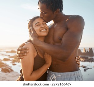 Couple hug or forehead kiss on sunset beach in relax romance holiday, love vacation date or bonding summer. Smile, black woman or kissing man in swimwear embrace, trust or travel support by ocean sea - Shutterstock ID 2272166469