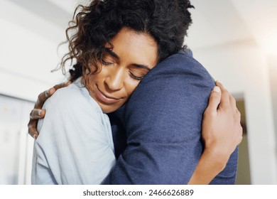 Couple, hug and happy in home with love, care and connection with reunion, bonding and thinking. Woman, man and partner with embrace, smile and security in relationship for trust in apartment - Powered by Shutterstock